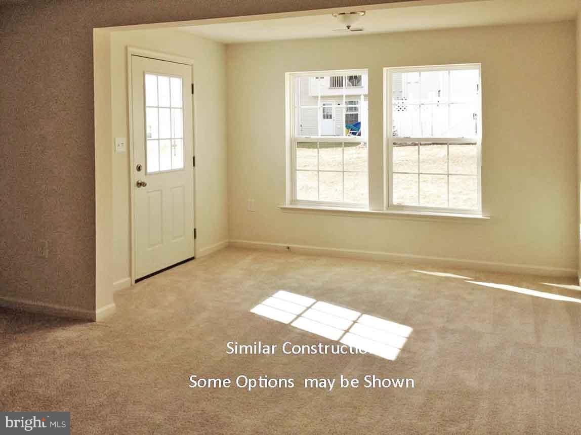 0 Rumbling Rock Road Hedgesville, WV 25427 - Photo 19 of 19 an empty room with windows