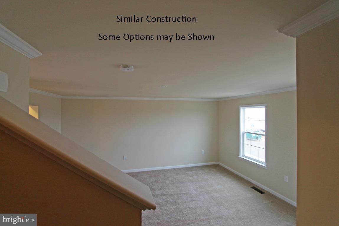 0 Rumbling Rock Road Hedgesville, WV 25427 - Photo 5 of 19 a view of an empty room and window