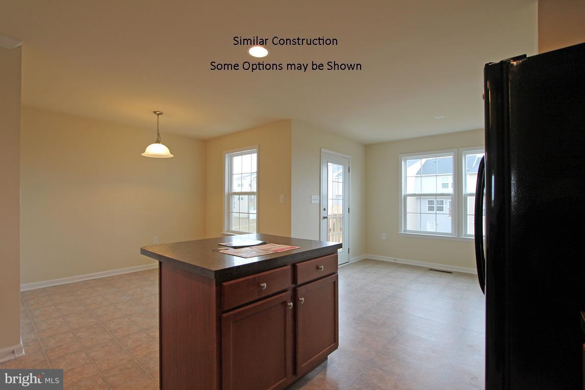 0 Rumbling Rock Road Hedgesville, WV 25427 - Photo 7 of 19 a kitchen with cabinets and window