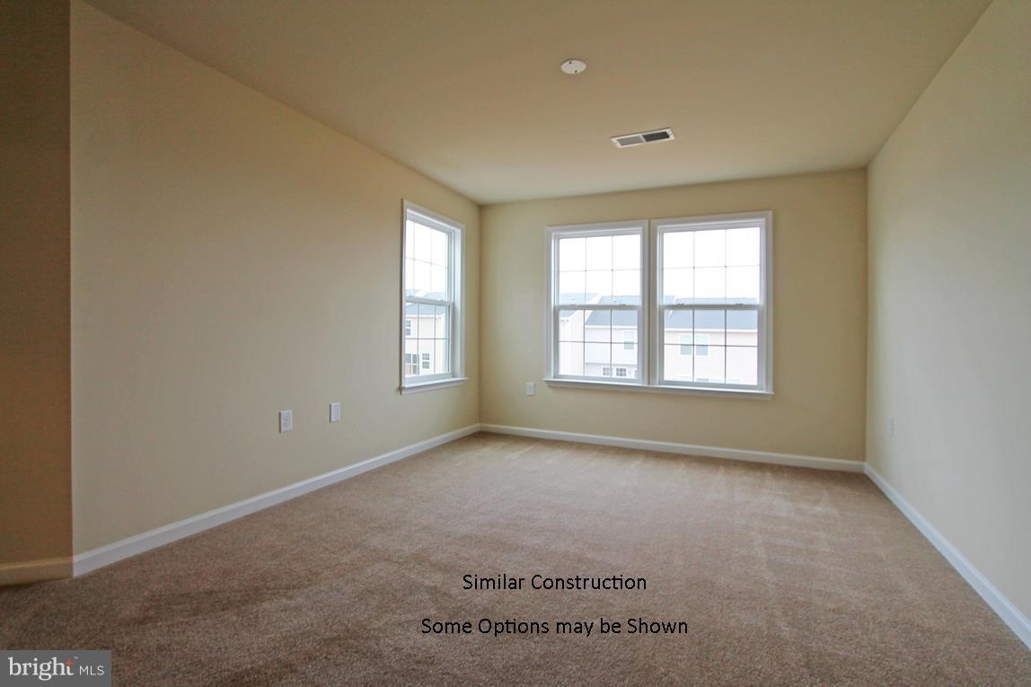 0 Rumbling Rock Road Hedgesville, WV 25427 - Photo 10 of 19 an empty room with windows