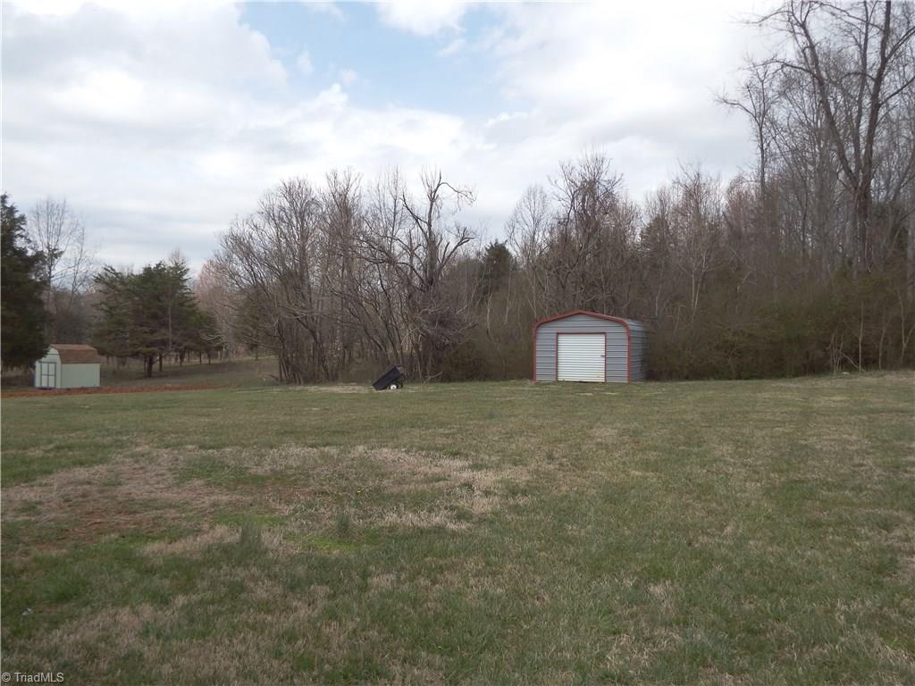 3235 Wide Country Road Pfafftown, NC 27040 - Photo 14 of 17 HUGE Level Backyard almost 1/2 Acre Lot!
