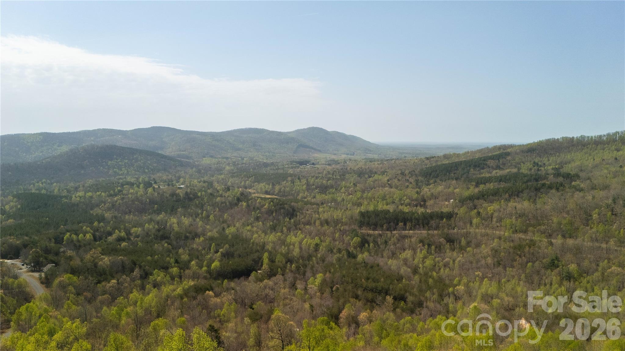 Tbd Owls Ridge Drive Apex, NC 27523 - Photo 14 of 14 a view of a mountain range with lush green forest