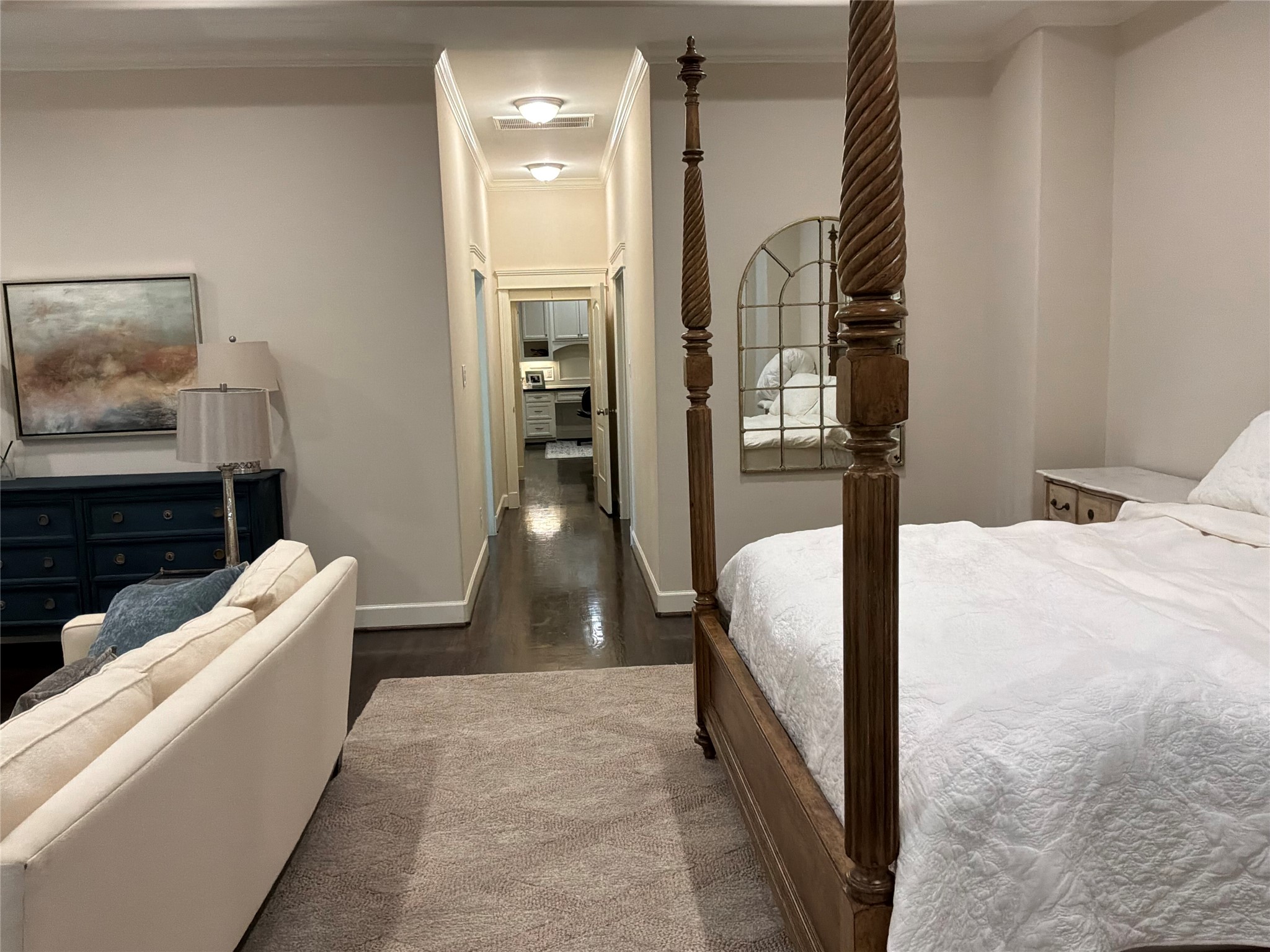 922 Alexander Street Houston, TX 77008 - Photo 23 of 40 More of Primary suite with the bed on the right, sitting to left and the long hall that you enter thru.