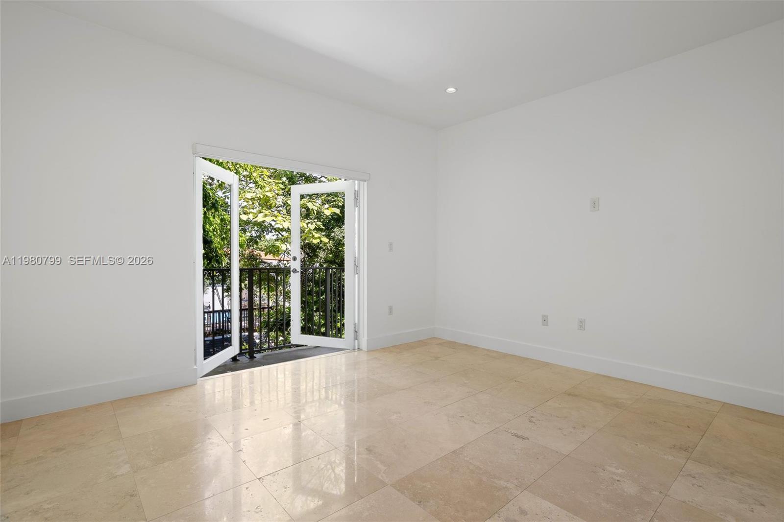 2786 Southwest 34th Avenue Miami, FL 33133 - Photo 18 of 42 a view of an empty room with a window