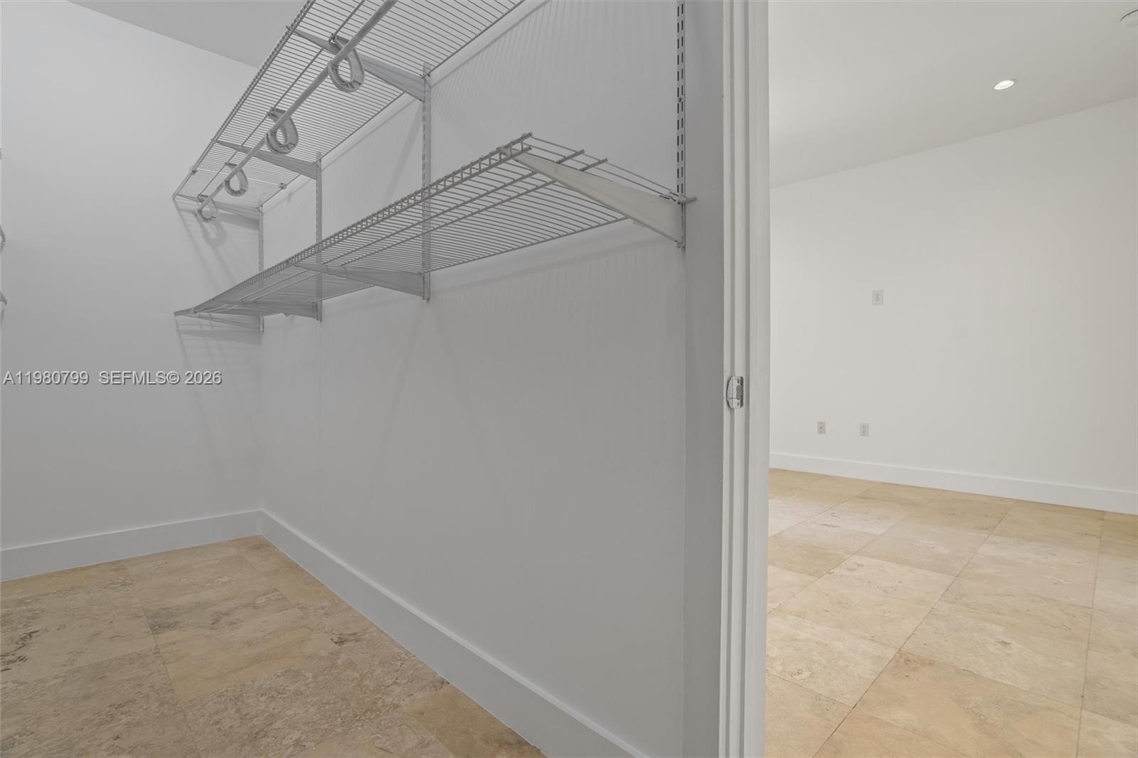 2786 Southwest 34th Avenue Miami, FL 33133 - Photo 22 of 42 a view of a room with racks on the wall