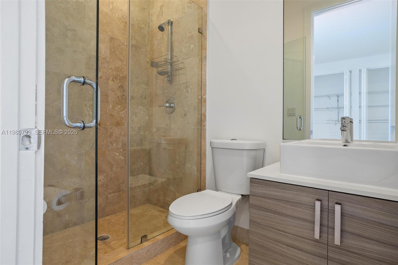2786 Southwest 34th Avenue Miami, FL 33133 - Photo 25 of 42 a bathroom with a toilet a sink and shower