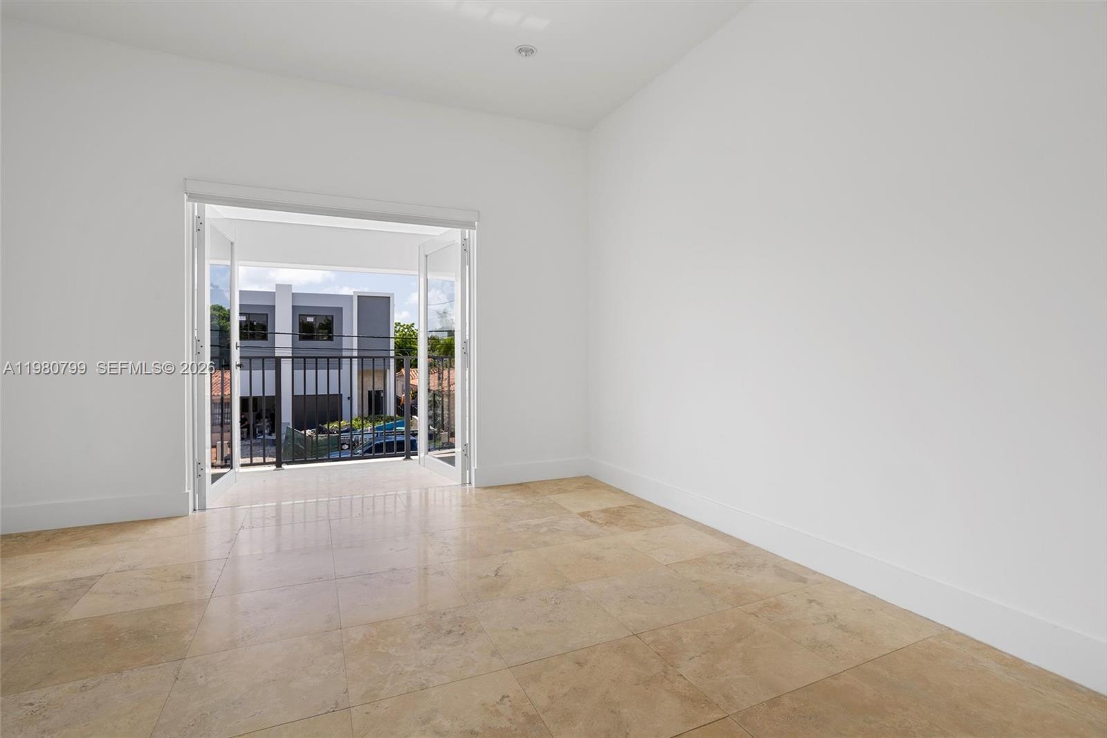 2786 Southwest 34th Avenue Miami, FL 33133 - Photo 29 of 42 an empty room with entrance door