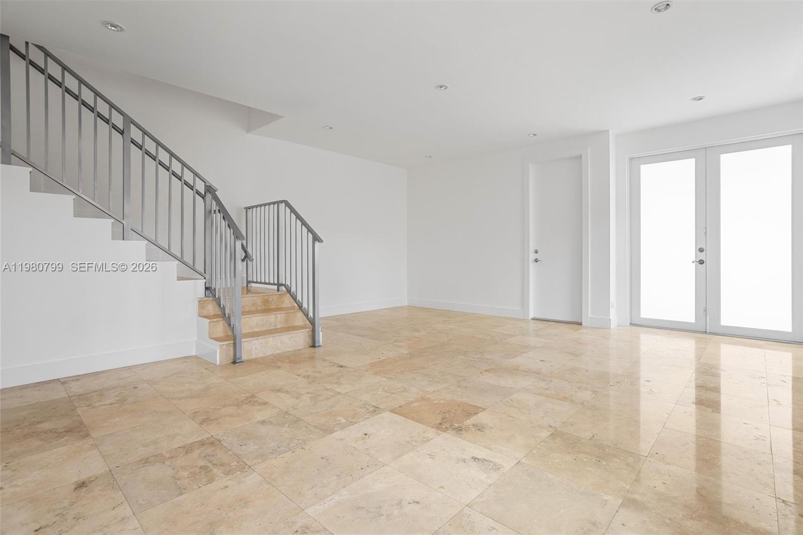 2786 Southwest 34th Avenue Miami, FL 33133 - Photo 7 of 42 a view of an empty room with stairs