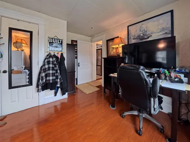 a bathroom with a sink a toilet and a shower