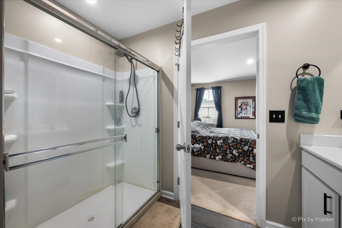 205 North Buckeye Street Waterman, IL 60556 - Photo 12 of 34 a bathroom with a shower