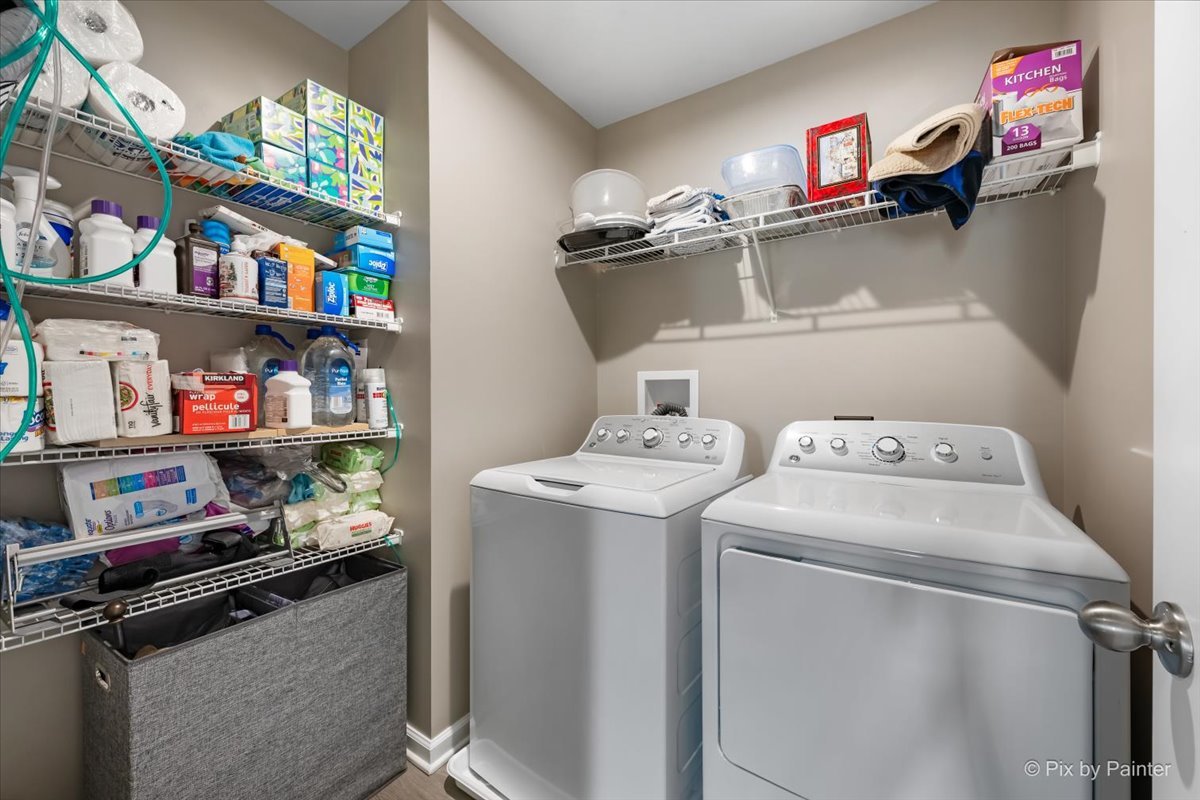 205 North Buckeye Street Waterman, IL 60556 - Photo 19 of 34 a utility room with dryer and washer