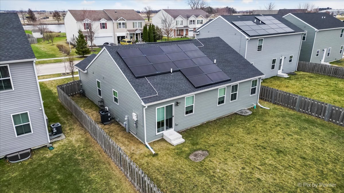 205 North Buckeye Street Waterman, IL 60556 - Photo 24 of 34 a aerial view of a house with a yard