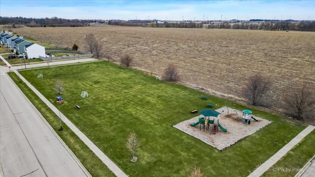 205 North Buckeye Street Waterman, IL 60556 - Photo 31 of 34 a view of a backyard with a lake view
