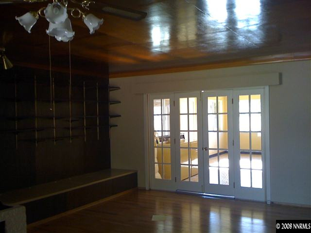 15110 Kivett Lane Reno, NV 89521 - Photo 3 of 9 a view of empty room with windows