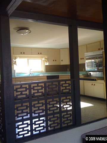 15110 Kivett Lane Reno, NV 89521 - Photo 5 of 9 a view of a glass door and outdoor space