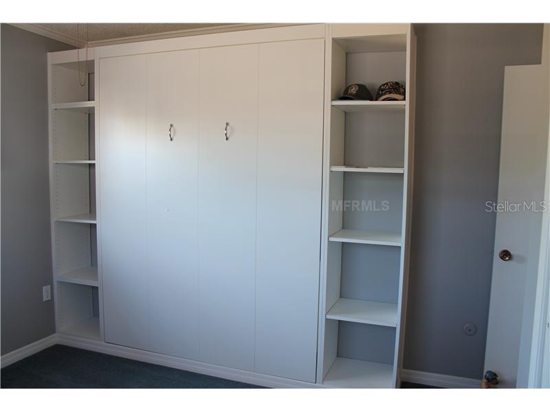 124 Dartmouth Road Venice, FL 34293 - Photo 11 of 13 Bedroom 3 - Murphy bed built-in.