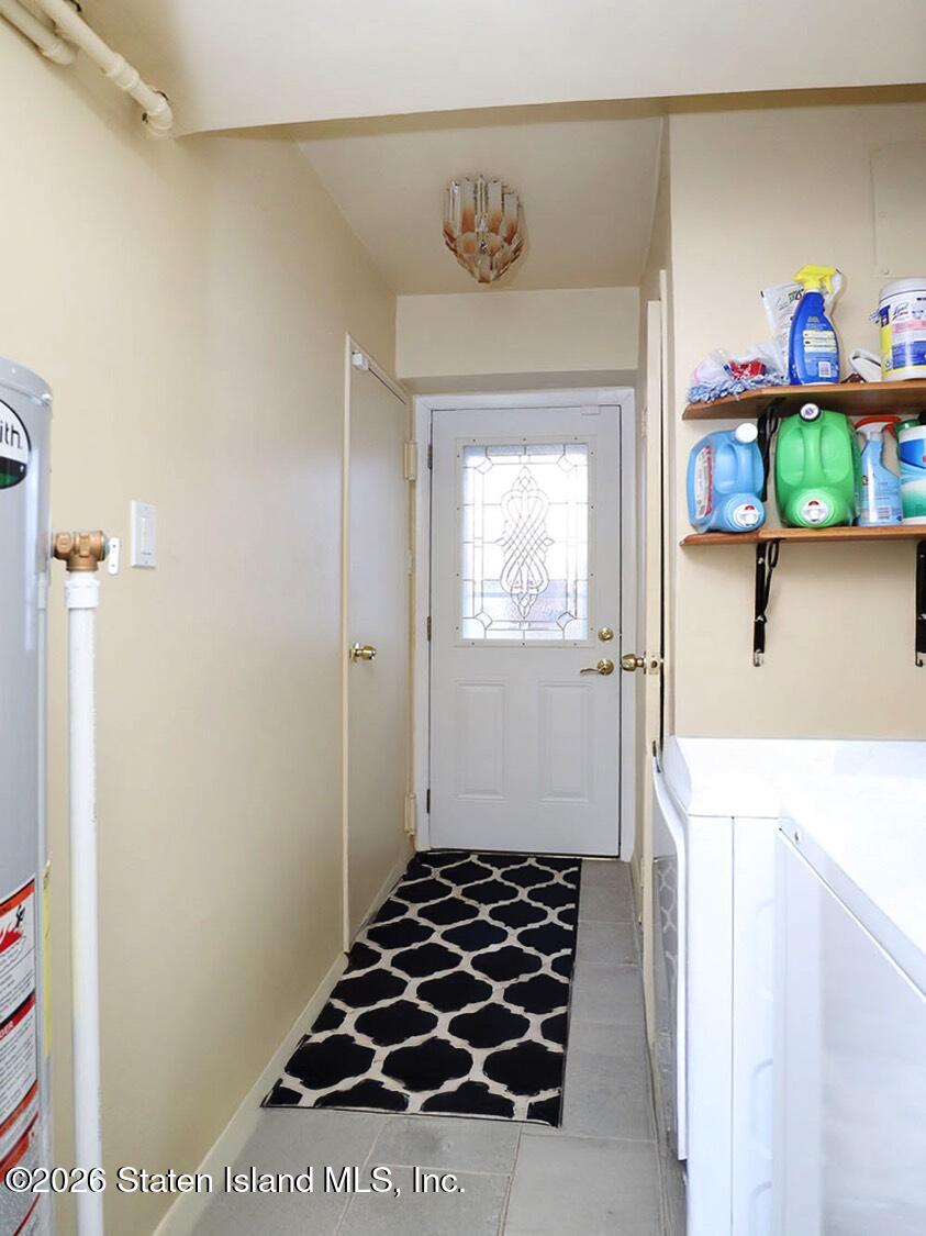 11 Firth Road Staten Island, NY 10314 - Photo 22 of 34 a bathroom with a bathtub and a sink