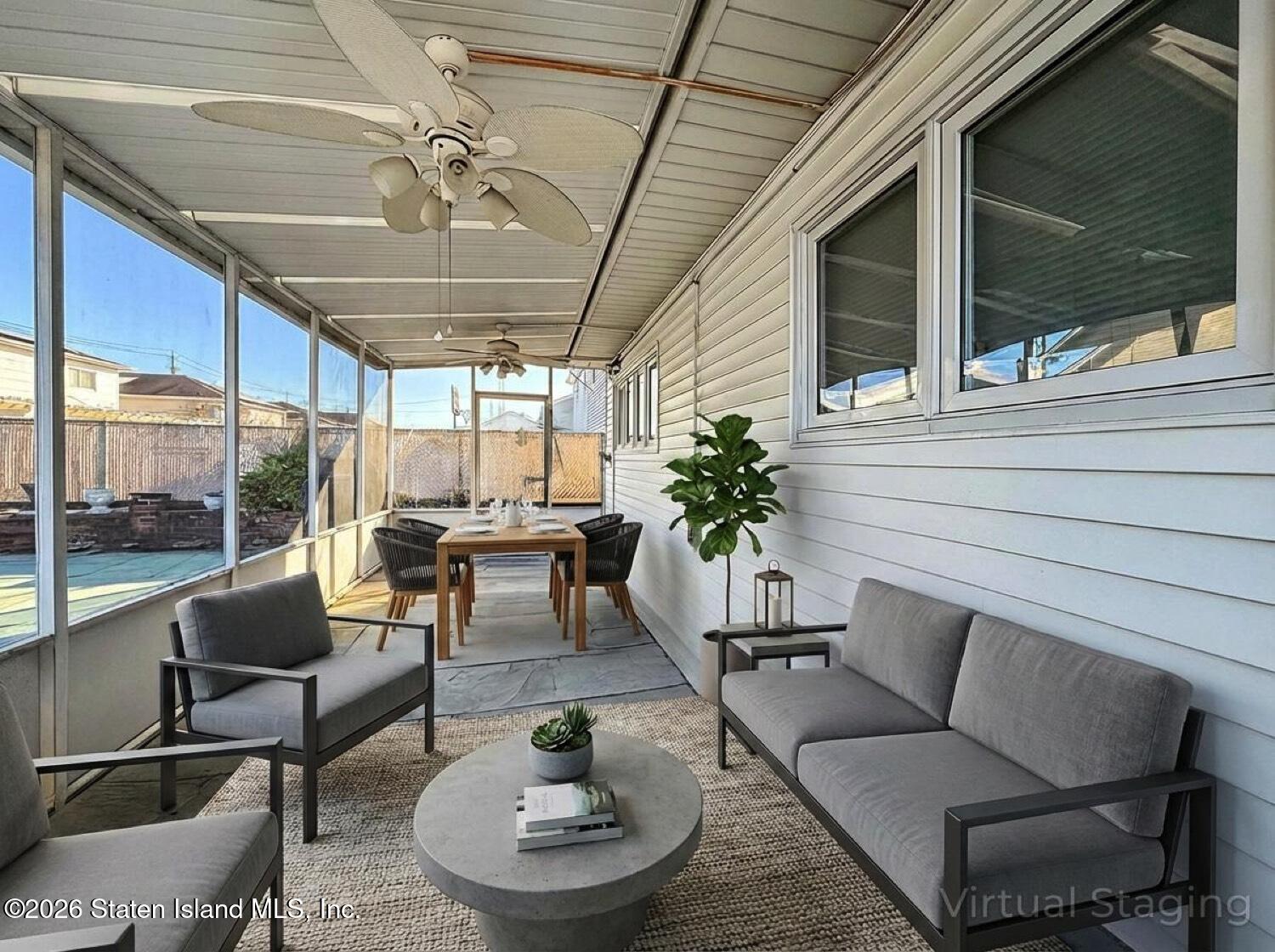 11 Firth Road Staten Island, NY 10314 - Photo 26 of 34 a view of a patio with couches and potted plants