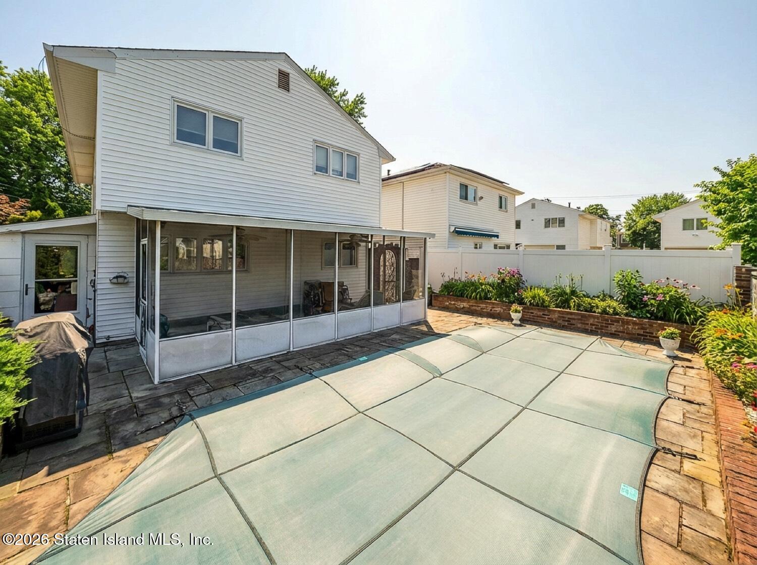 11 Firth Road Staten Island, NY 10314 - Photo 27 of 34 a view of a house with a large space in front of it