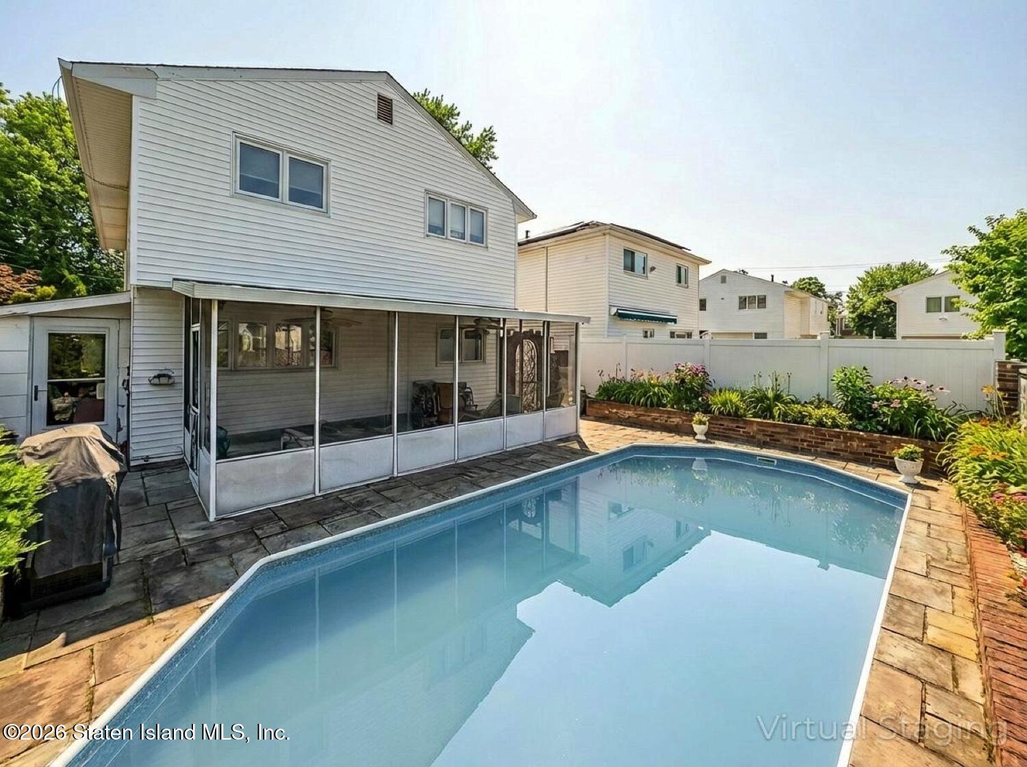 11 Firth Road Staten Island, NY 10314 - Photo 28 of 34 a view of a house with pool