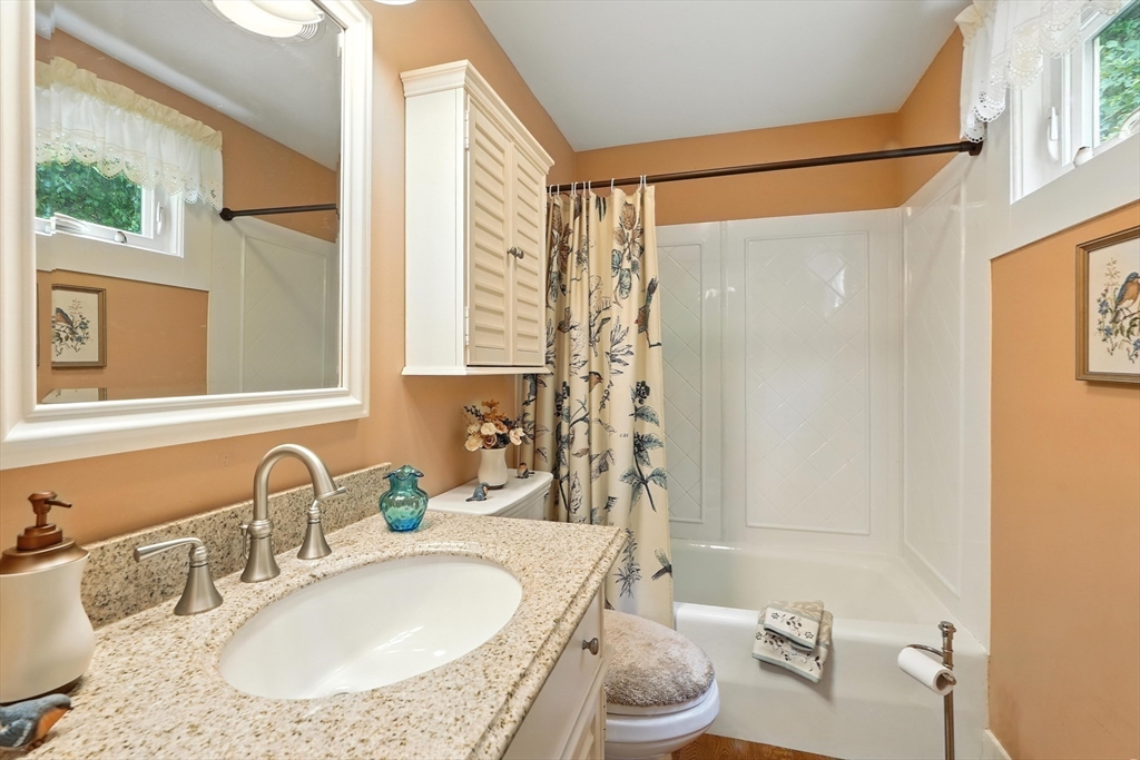 8 Craig Avenue Montague, MA 01349 - Photo 21 of 40 a bathroom with a granite countertop sink toilet and shower