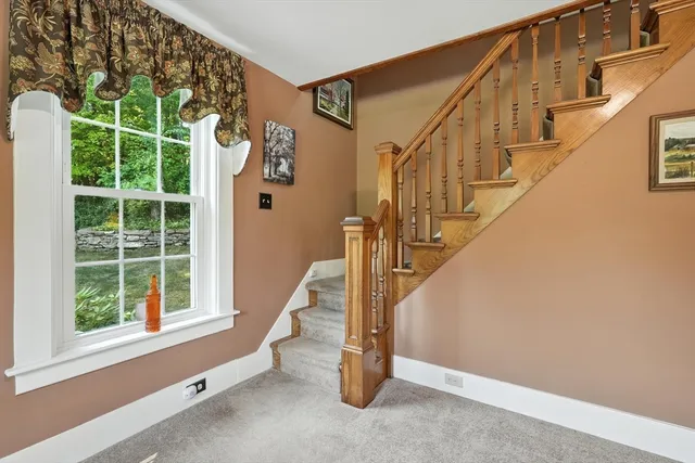 a view of entryway with a front door