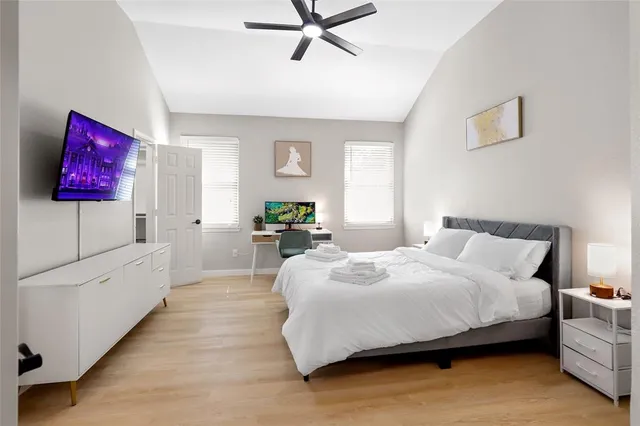 a bedroom with a bed and window