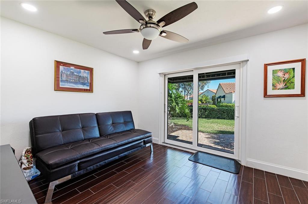 748 Reef Point Circle Naples, FL 34108 - Photo 17 of 23 Sitting room featuring wood tiled floors, recessed lighting, and a ceiling fan