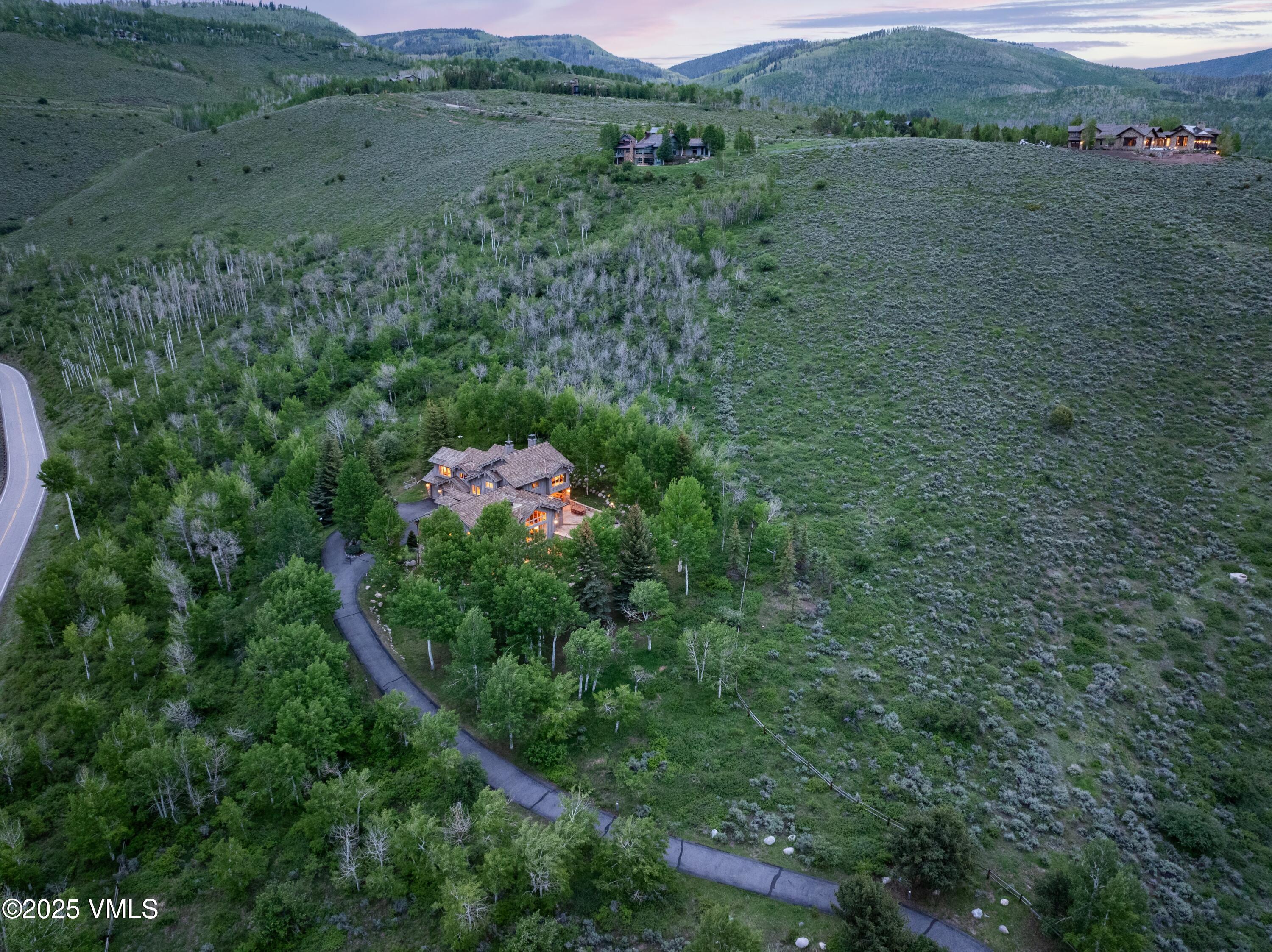 2005 West Wildwood Road Avon, CO 81620 - Photo 33 of 36 2506_2005_wildwood_aerial_twilight_a