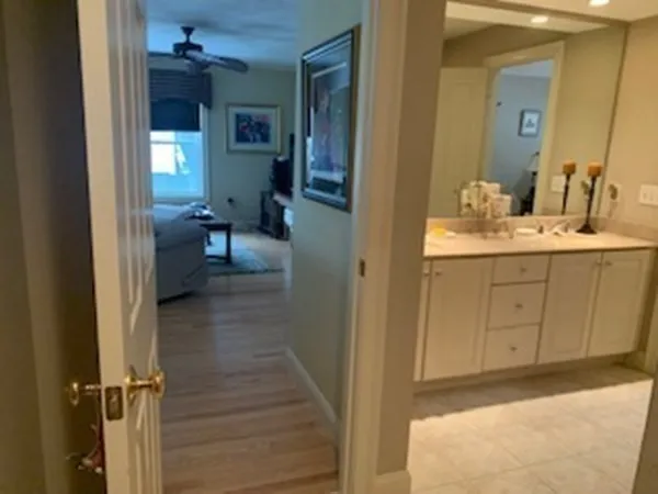 a bathroom with a sink and mirror