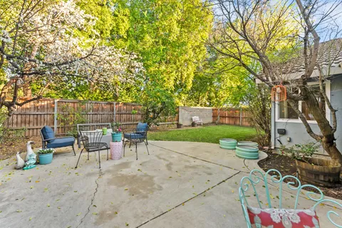a view of a backyard with a patio