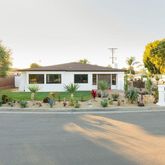 front view of a house with a street