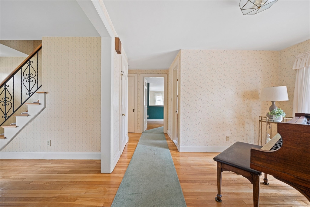 10 Robin Road Westwood, MA 02090 - Photo 11 of 37 a view of a workspace with furniture and wooden floor