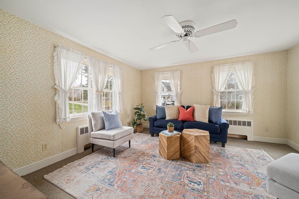 10 Robin Road Westwood, MA 02090 - Photo 18 of 37 a living room with furniture and a window