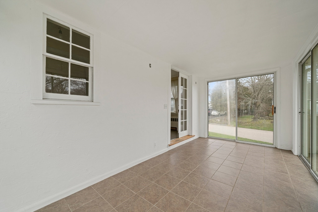 10 Robin Road Westwood, MA 02090 - Photo 21 of 37 a view of an empty room with a window