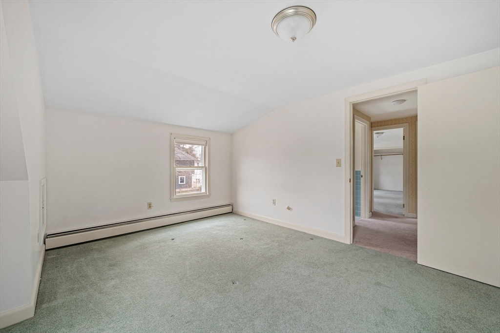 10 Robin Road Westwood, MA 02090 - Photo 23 of 37 a view of an empty room with a window
