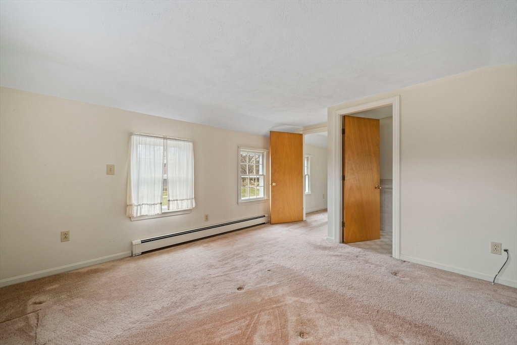 10 Robin Road Westwood, MA 02090 - Photo 28 of 37 an empty room with windows