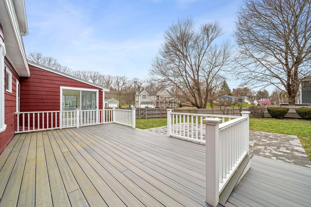 10 Robin Road Westwood, MA 02090 - Photo 30 of 37 a view of backyard with deck and wooden floor