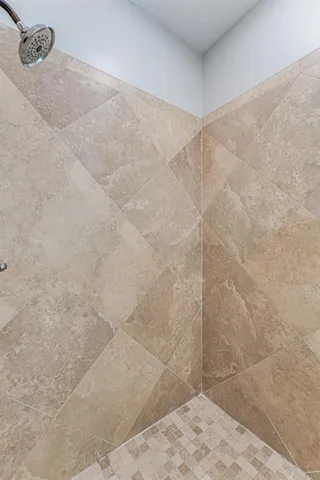 a view of a house with yard and front view of a house