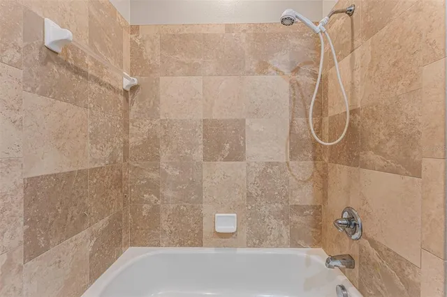 an aerial view of a house with a garden