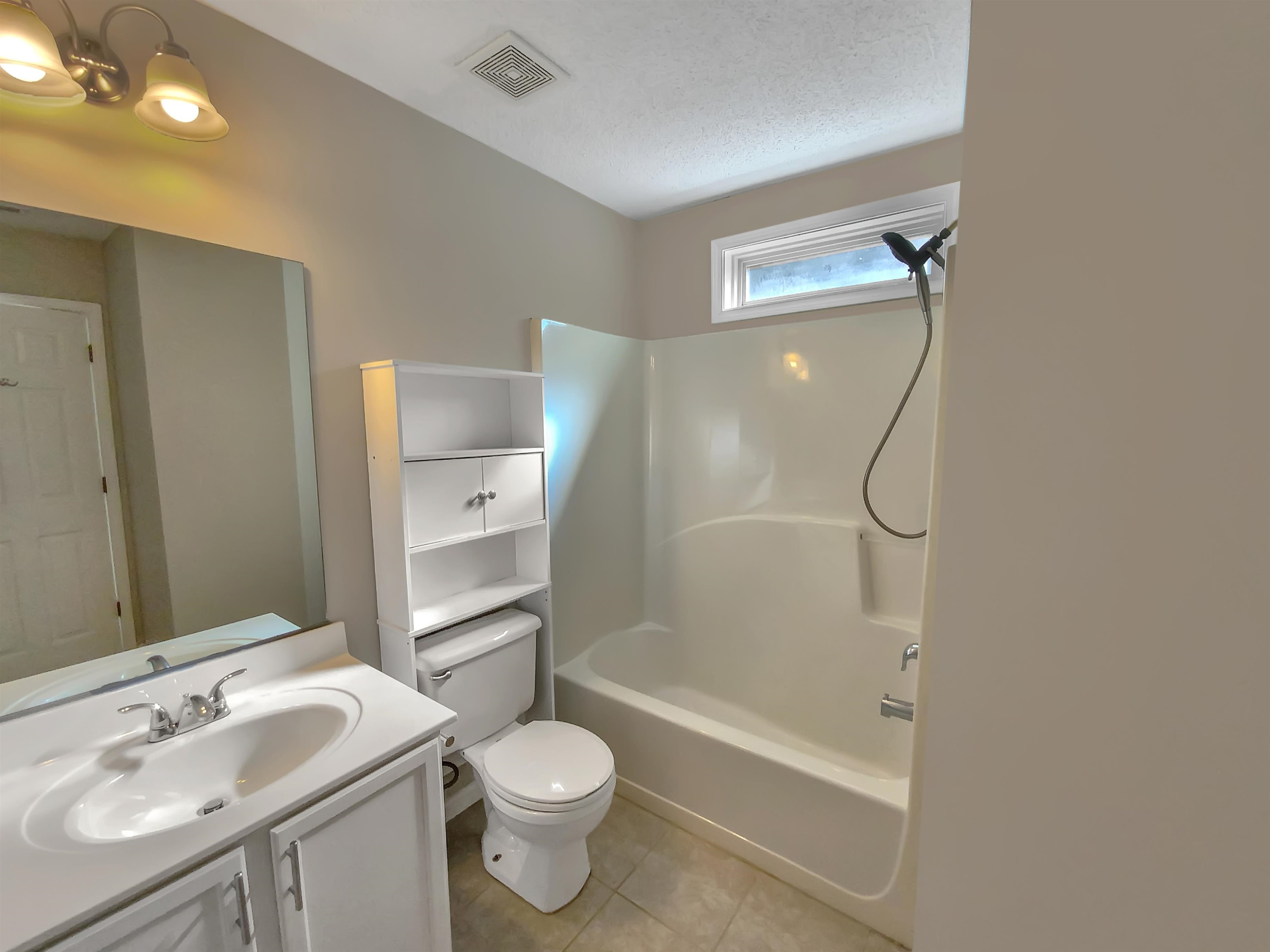 113 Brierridge Drive Apex, NC 27502 - Photo 12 of 20 a bathroom with a sink a toilet and shower