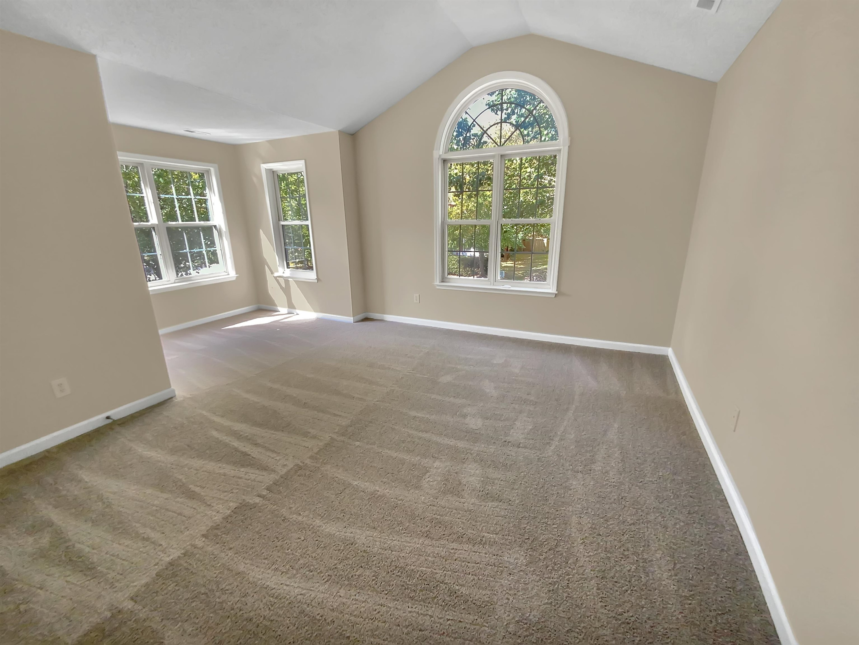 113 Brierridge Drive Apex, NC 27502 - Photo 14 of 20 an empty room with windows