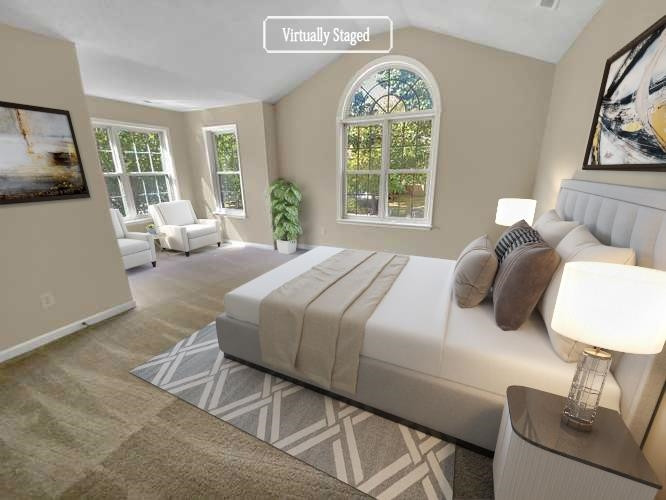 113 Brierridge Drive Apex, NC 27502 - Photo 3 of 20 a bedroom with a bed and a large window