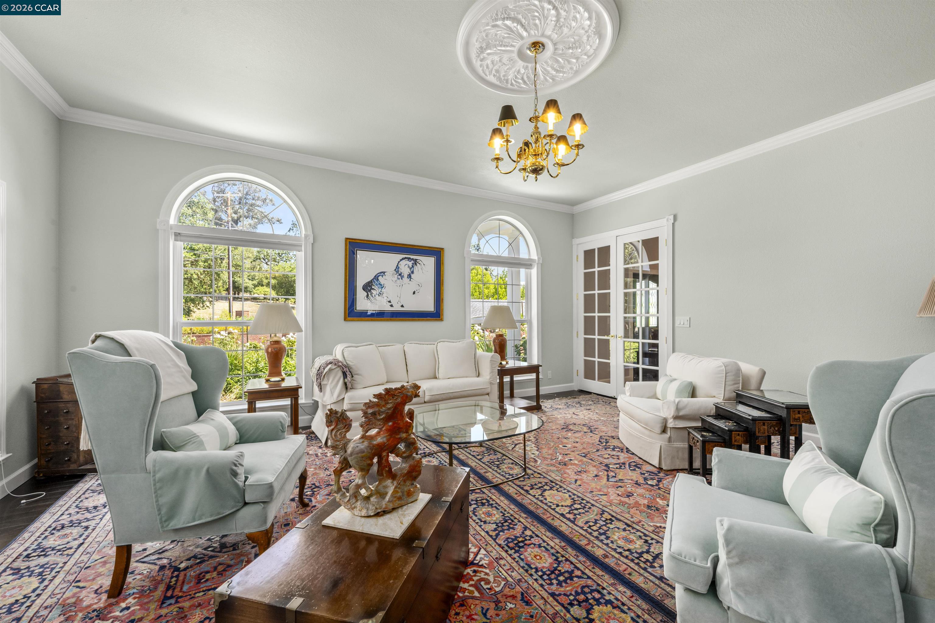 177 Oak Road Alamo, CA 94507 - Photo 6 of 85 a living room with furniture chandelier and a large window