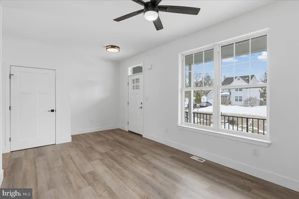 a view of an empty room with a window