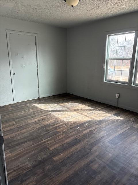 2316 38th Street Lubbock, TX 79412 - Photo 3 of 11 an empty room with wooden floor and windows