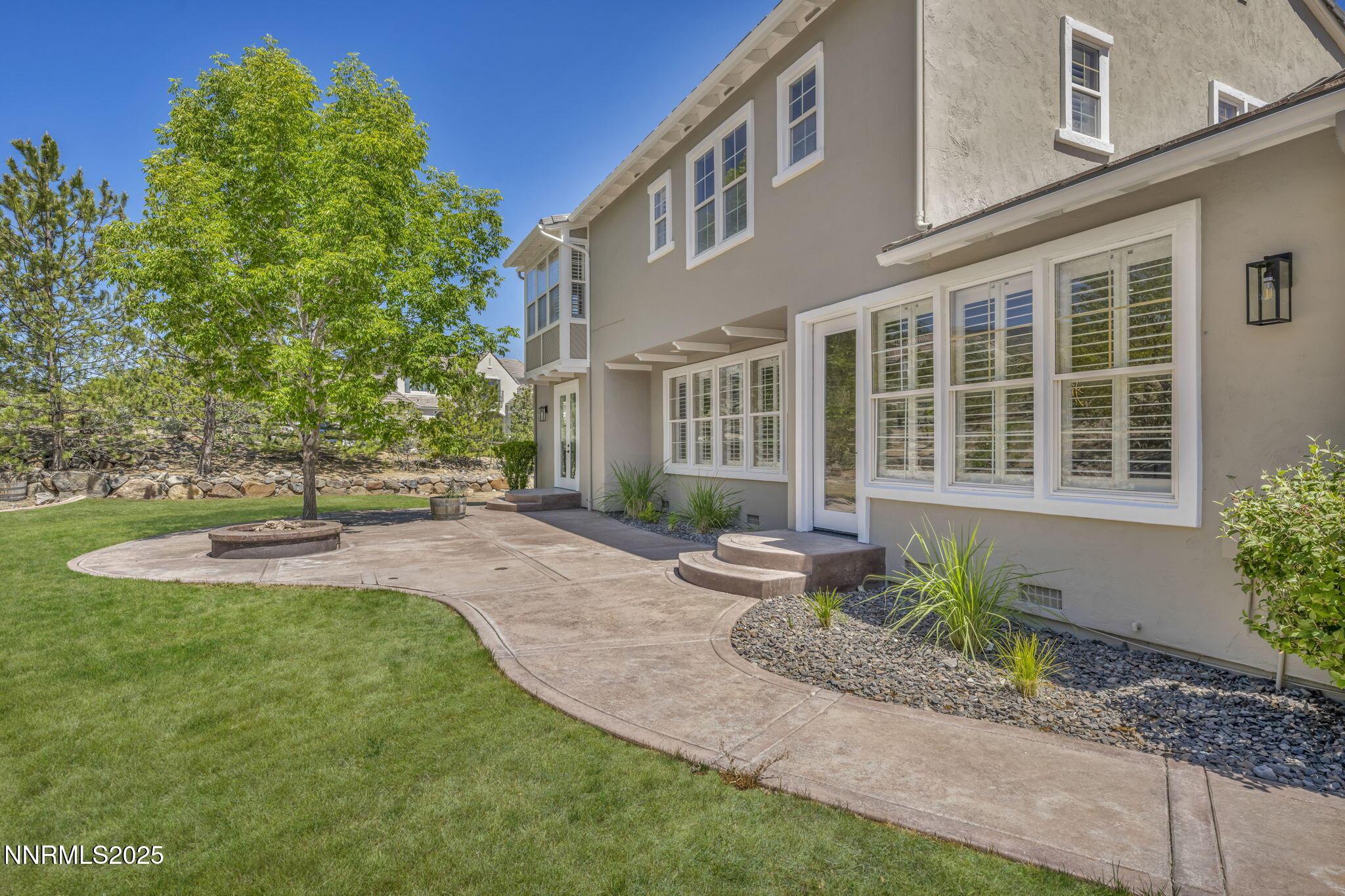 2965 Roundrock Court Reno, NV 89511 - Photo 104 of 119 a view of a house with a yard and sitting area