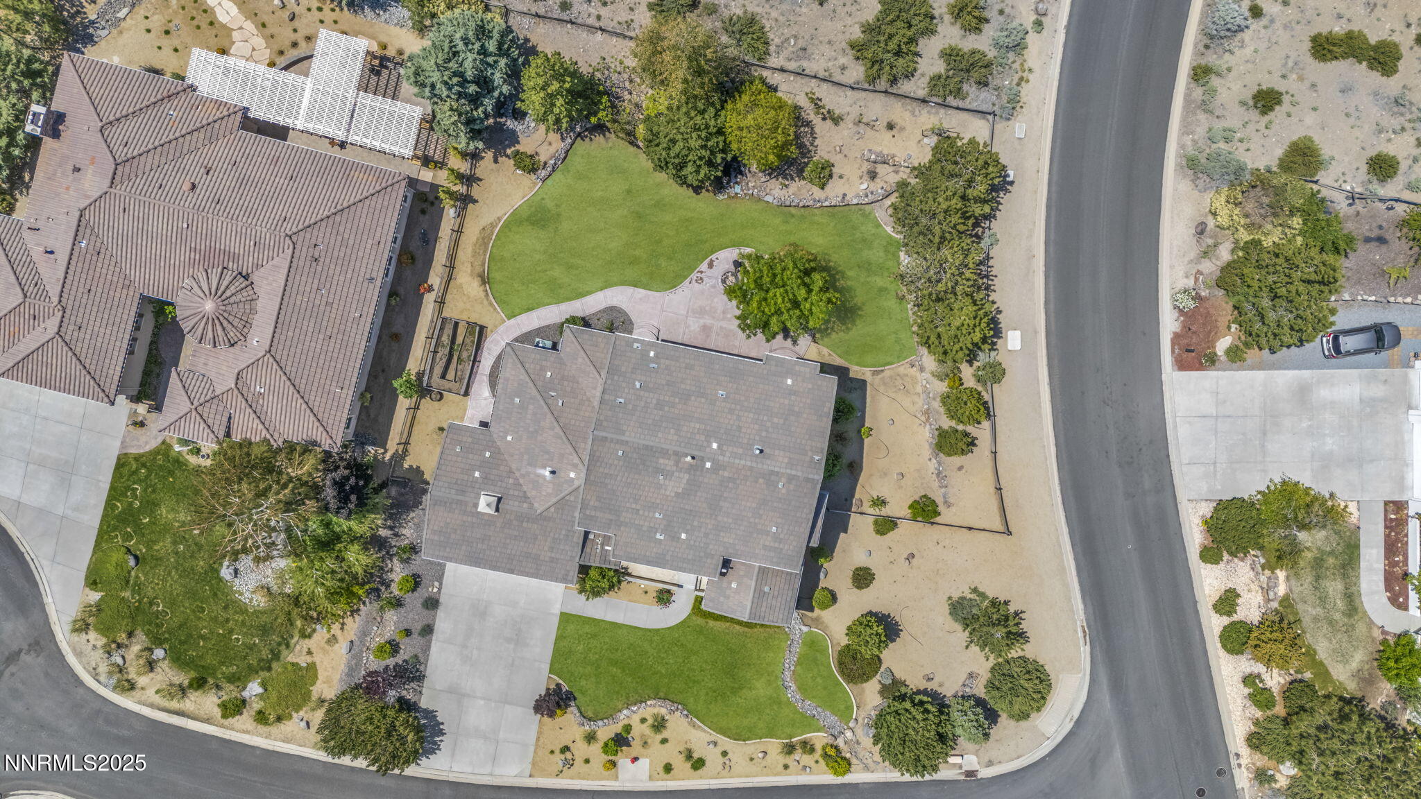 2965 Roundrock Court Reno, NV 89511 - Photo 115 of 119 an aerial view of a house with a swimming pool