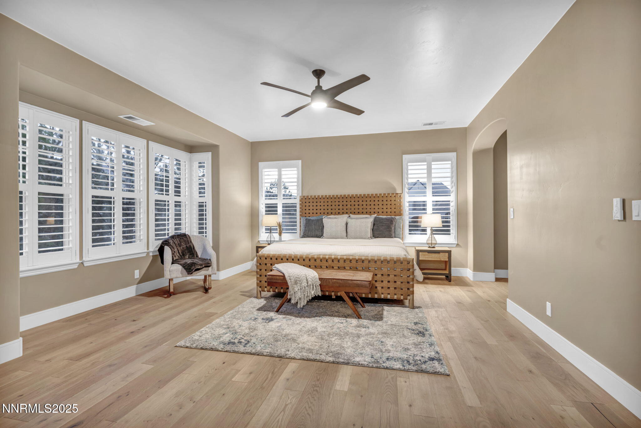 2965 Roundrock Court Reno, NV 89511 - Photo 13 of 119 a bedroom with a bed a large window and potted plant on the dresser