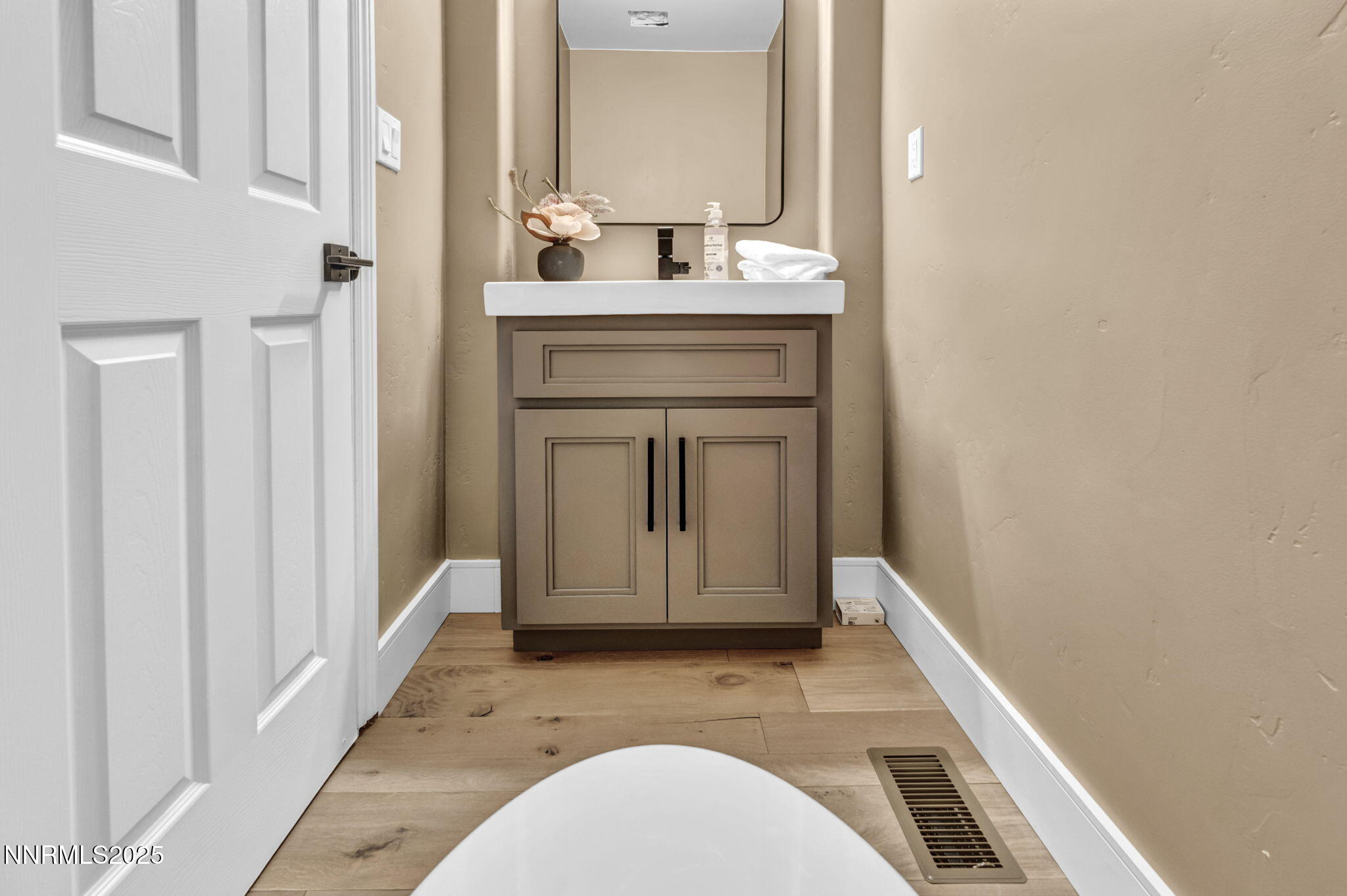 2965 Roundrock Court Reno, NV 89511 - Photo 34 of 119 a bathroom with a sink a toilet and mirror
